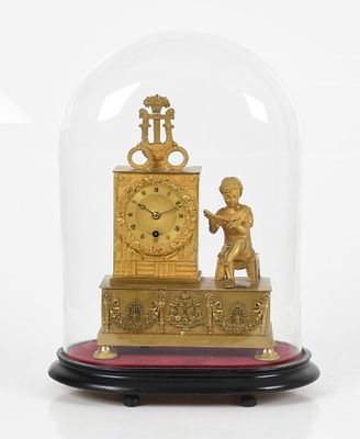 A French Charles X Gilt Bronze Shelf Clock 
Circa 1820, with circular gadrooned feet 