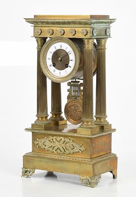 French Gilt Bronze Portico Clock, Second Quarter 19th Century. A French Gilt Bronze Portico 