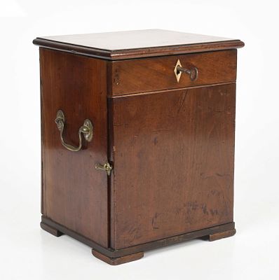 A George III Mahogany Apothecary Chest 
Rectangular with a locking lid that opens to 