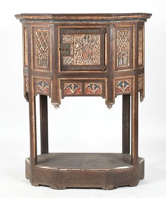 Continental Gothic Style Polychromed Carved Oak Cupboard. A Continental Gothic Style Polychromed 