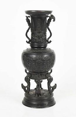 A Meiji Period Japanese Bronze Vase 
Constructed in multiple parts, the molded circular 