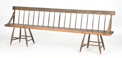 A 19th Century Windsor Bench 
With a simple plank seat supported by a chair type 