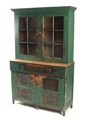 A Green Painted Stepback Cupboard 
American, 19th century, with five turned feet below a 
