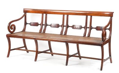 A Classical Mahogany and Cane Seat Quadruple-Back Settee, c. 1830 
With carved horizontal 