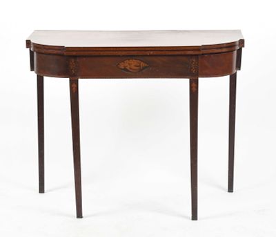 A Federal Inlaid Mahogany Card Table, New England, Early 19th Century 
The hinged shaped 
