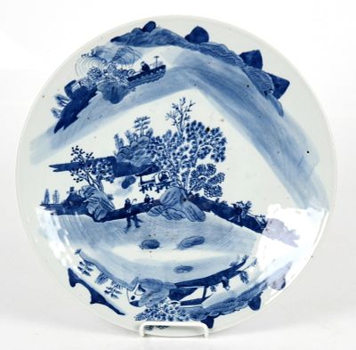 A Chinese Export Blue and White Porcelain Charger 
Decorated with a landscape featuring a 