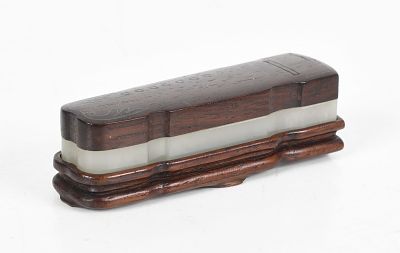 A Chinese Jade and Wood Qin Form Box 
Qing dynasty, a box and stand in carved white 
