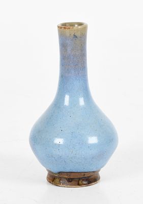 A Chinese Jun Ware Bottle Form Vase 
A Qing Dynasty example in a blue glaze that 