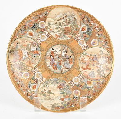 A Satsuma Charger 
Meiji period, a painted, enameled, and parcel gilt charger with 