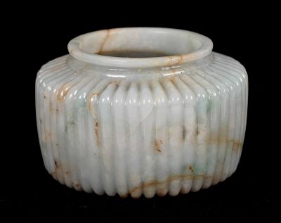 A Chinese Forty-Eight Lobed Jade Jar. A Chinese Forty-Eight Lobed Jar 
Qing dynasty, carved in a 