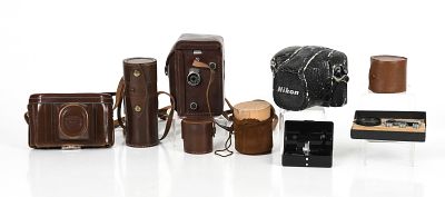 A Group of Vintage Cameras and Lenses 
A Group of 20th century camera equipment, 