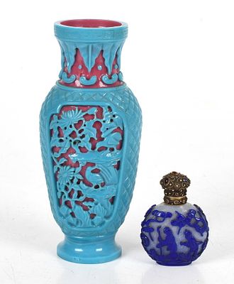 A Chinese Peking Glass Blue and Pink Vase 
Qing dynasty, baluster form, the glass pink 