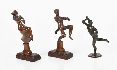 A Group of 20th Century Miniature Bronzes 
Comprising: a pair of 