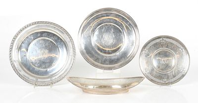 Four American Sterling Silver Plates, Marked for Various Makers, 20th Century 
Comprising: 