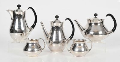 A Five Piece Tea Set, Elkington Designed by Eric Clements 
With three pots, an open 