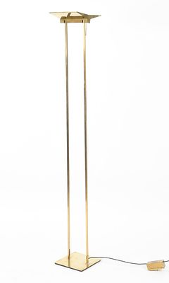 A Designer Brass Floor Lamp 
Circa 1980's, brass plated with an articulating head and 