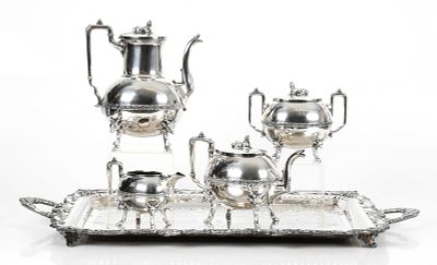 An Egyptian Revival Silver Plated Tea Set with Tray. An Egyptian Revival Tea Set with Tray 
Late 