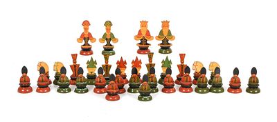 An Antique Russian Lacquered Chess Set 
In red and green, the figural pieces dressed in 