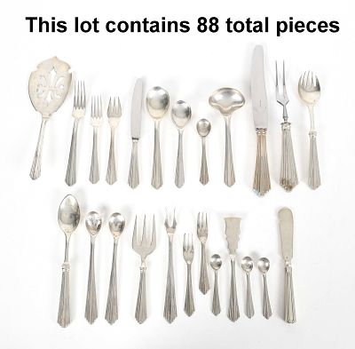 A Portuguese Art Deco 833 Silver Flatware Service, c. 1930 
Comprising: 12 knives, 10 