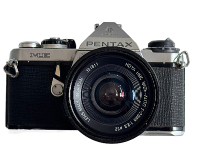 A Pentax me Hoya 28mm f2.8. 35mm SLR. Camera working
