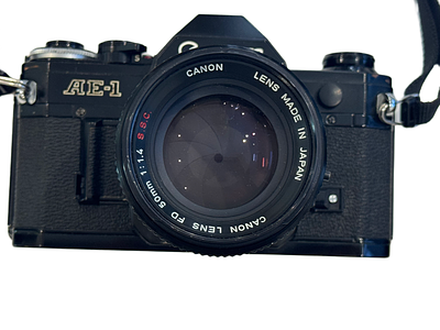 A Canon AE 1 film camera with 50mm l F1.4 SSC . Canon AE 1.4 35mm SLR camera with 50mm l F1.4 SSC