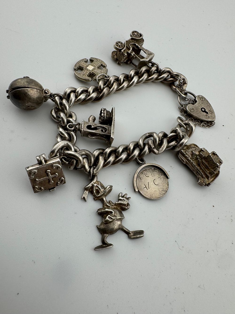 Lot 201: Silver Charm Bracelet