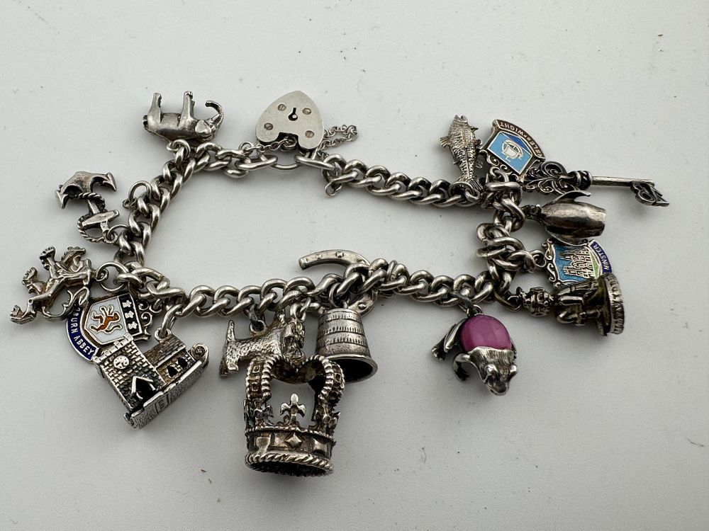 Lot 204: Sterling Silver Charm Bracelet