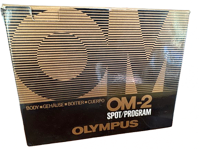 Olympus OM-2 Spot/Program camera body. On original box never been used
