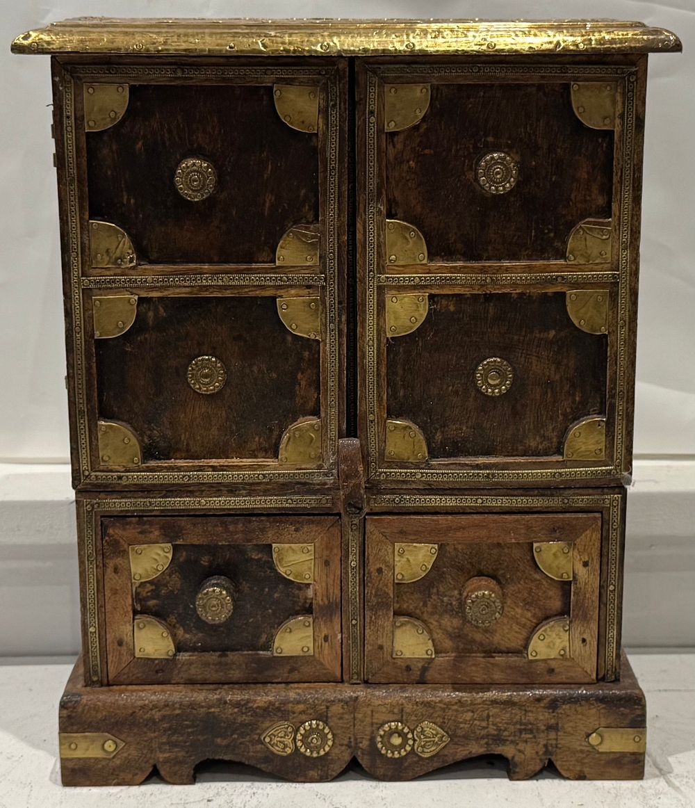Lot 168: wooden cabinet with brass fittings