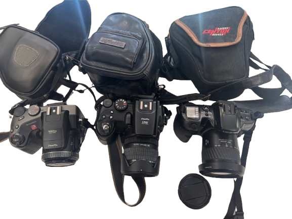 Lot 83: A 3 digital cameras