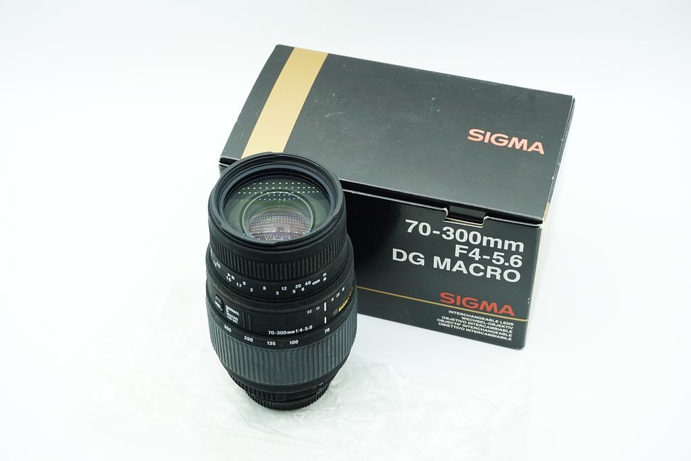 Lot 91: Sigma 70–300mm f/4–5.6 DG Macro Zoom Lens for Nikon F Mount w/ Box