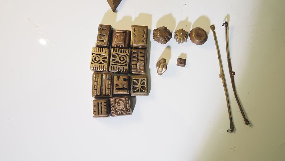 Lot 155: A Akan geometric bronze gold weights
