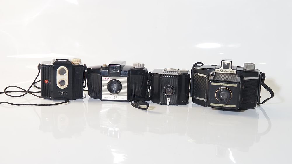 Lot 160: A Selection of 4 Baker light cameras