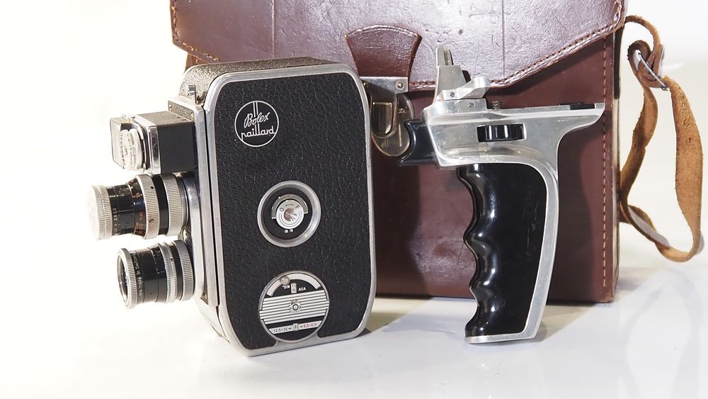 Lot 171: A Selection of  lenses Including Bolex camera