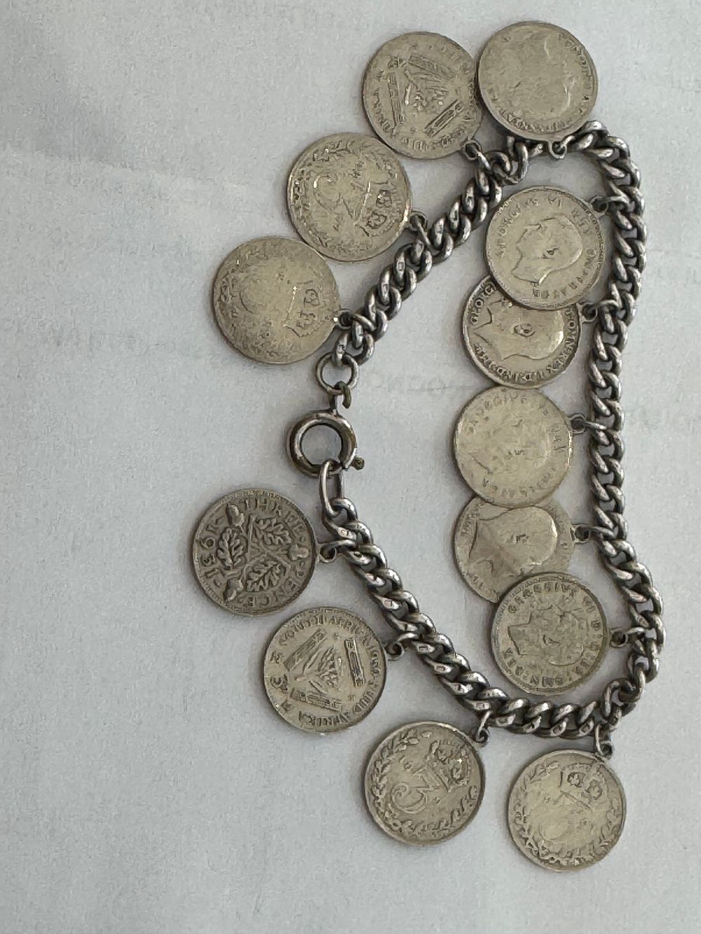 Lot 204: Silver breclete with coins 30.59
