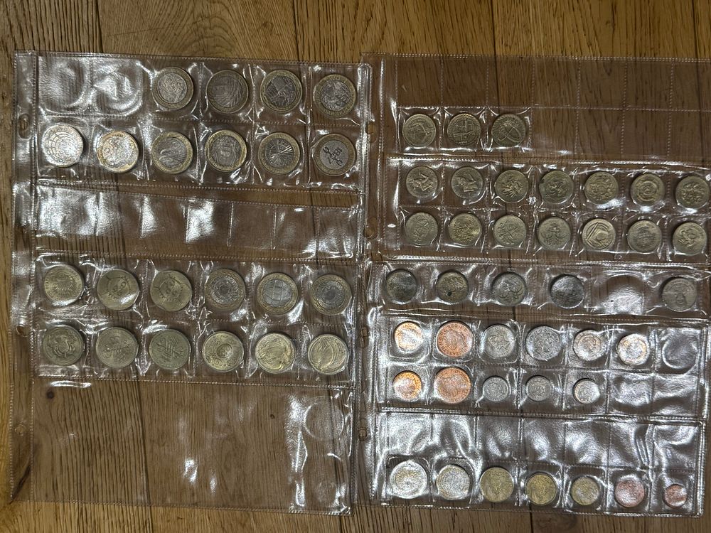 Lot 212: A collection of collectible £2 and £1 coins