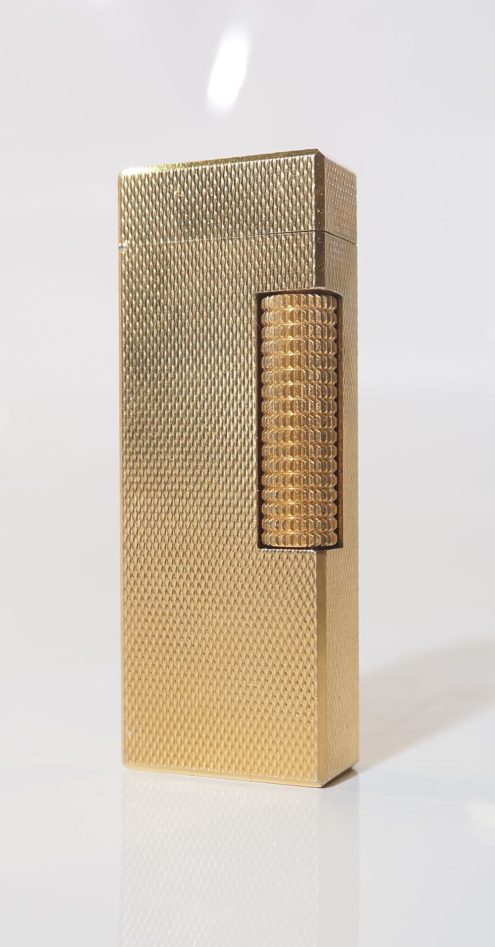 Lot 163: A Dunhill Swiss petrol lighter 24163