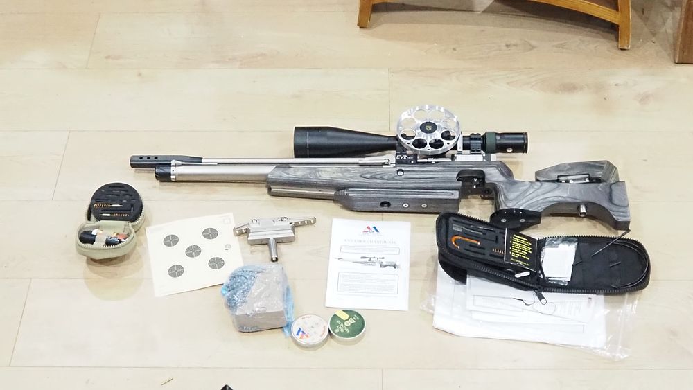 Lot 216: Air Arms EV2 Mk3 a high-end pre-charged pneumatic PCP air rifle Nikko Stirling Diamond Sportsman 10-50x60