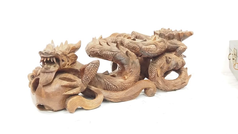 Lot 240: A vintage Chinese hand-carved dragon sculpture