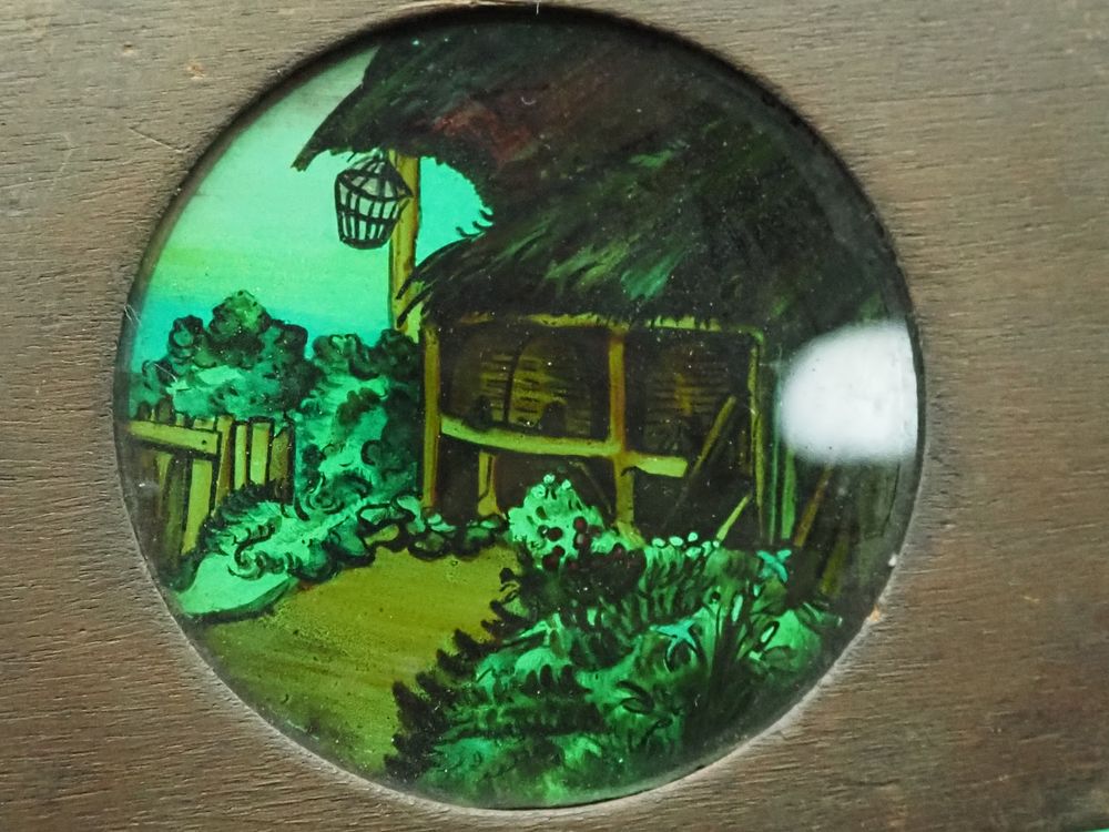 Lot 241: a 9 Victorian kaleidoscope magic lantern slide with brass mounts