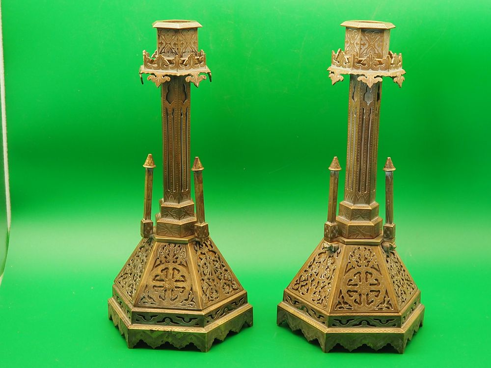 Lot 247: France Gothic style brass church candle holders.