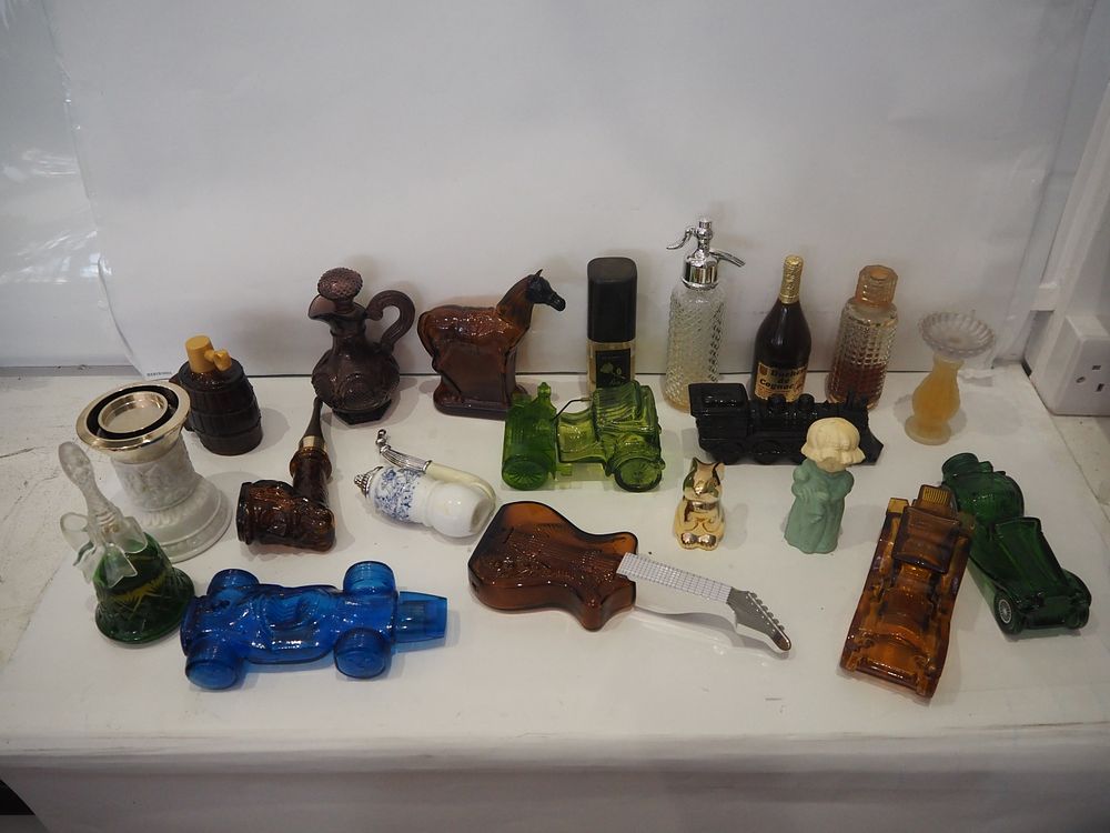Lot 185: a collection of perfume bottles