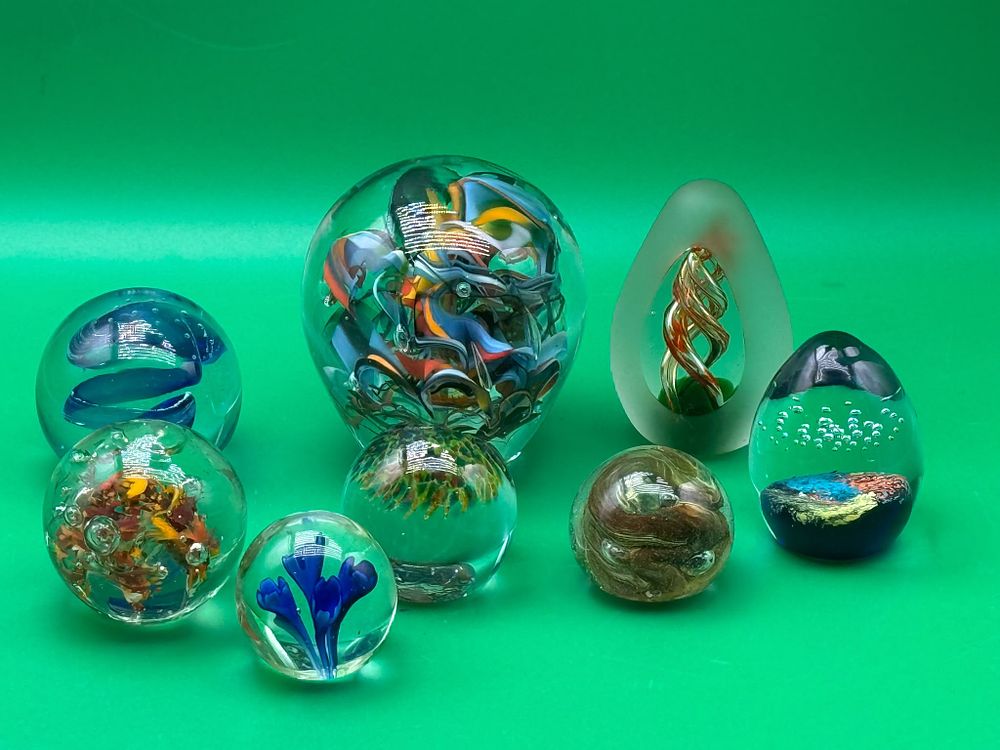 Lot 267:  
Collection of Eight Art Glass Paperweights Swirl Floral and Abstract Designs