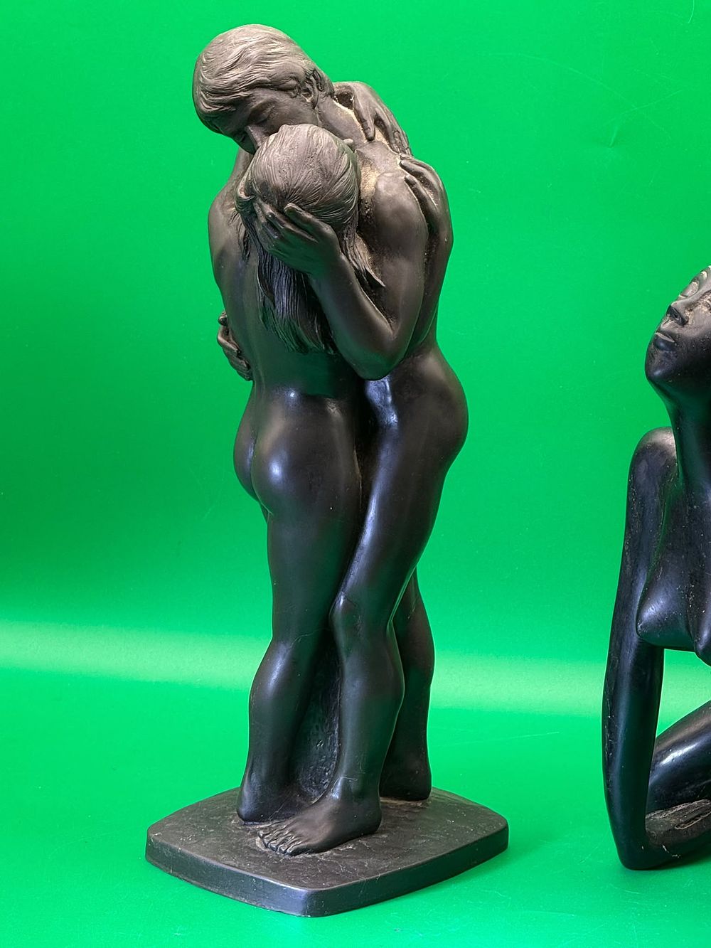 Lot 280: Two Black Finish Sculptures Embracing Couple and Stylised Female Figure