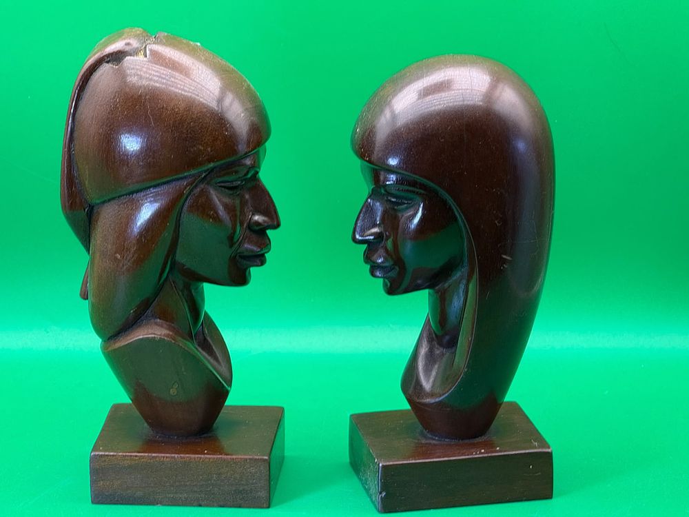 Lot 282: Pair of Hand Carved Dark Wood Profile Bust Sculptures