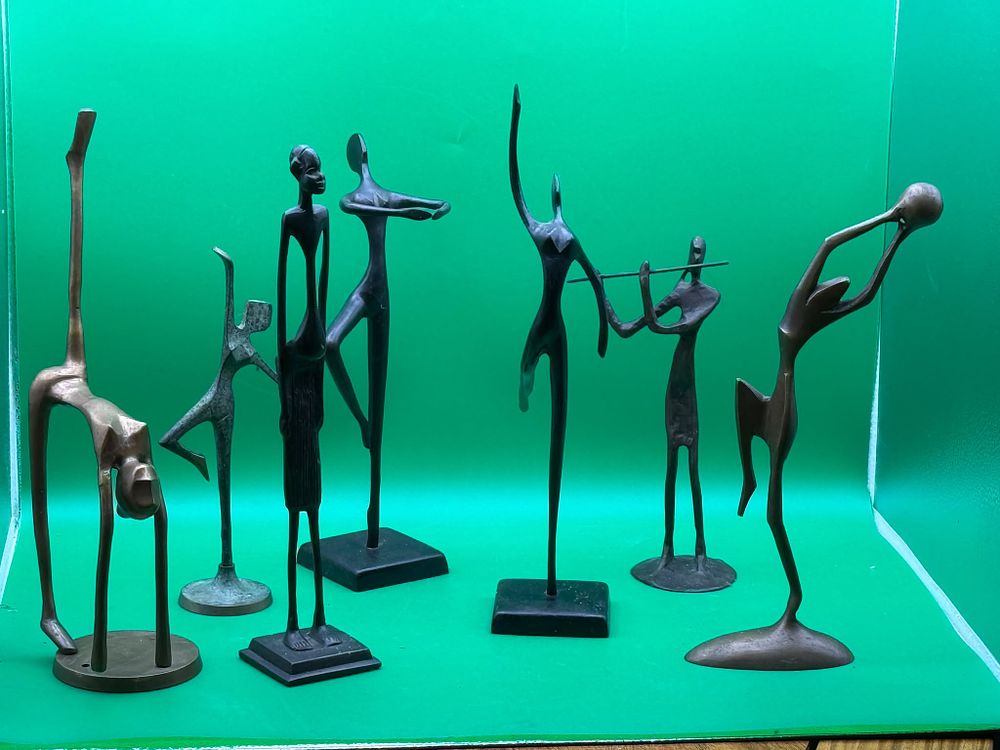 Lot 303: Seven Abstract Bronze Effect Sculptures Dancing and Musical Figures