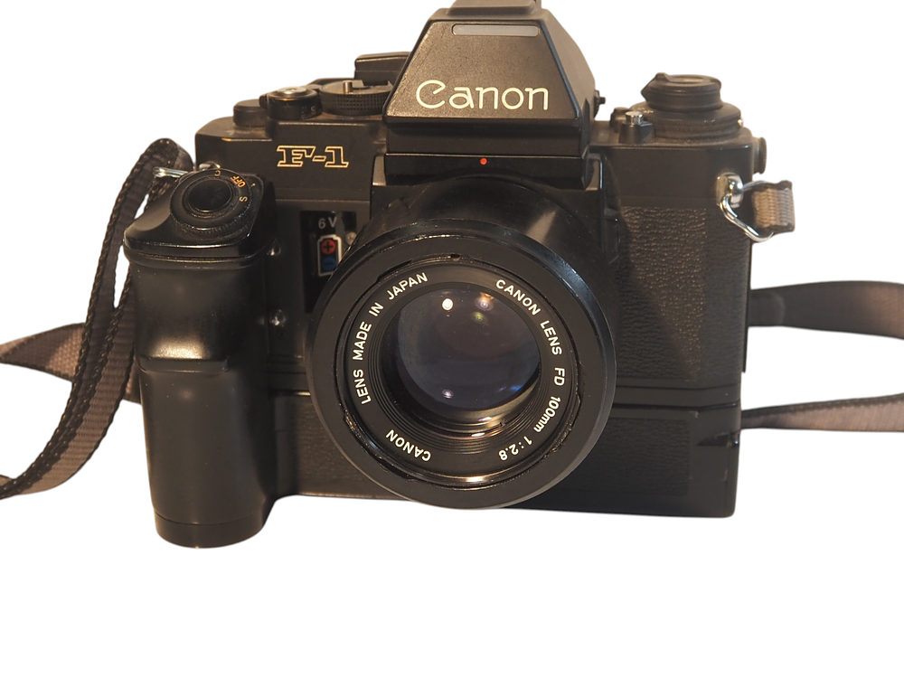 Lot 181: Canon F-1 Late Model SLR With AE Power Winder FN And FD 100mm f2.8 Lens