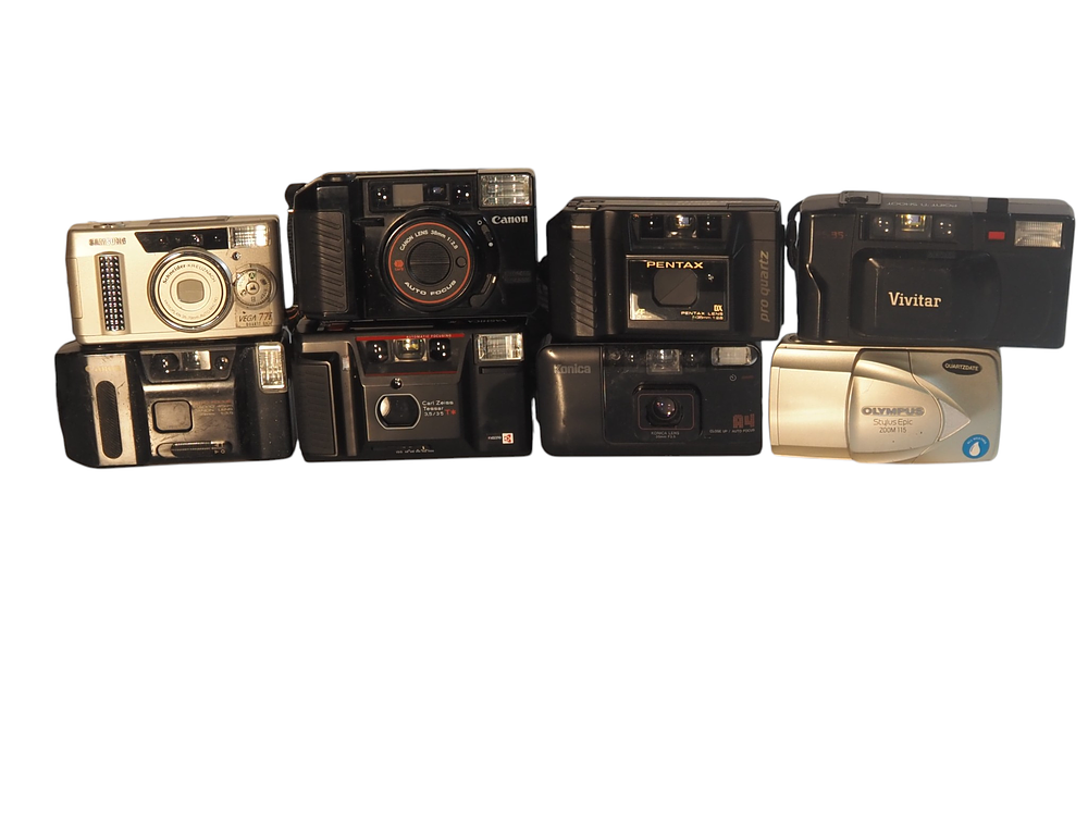 Lot 194: Lot of 8 Vintage 35mm Compact Film Cameras Canon Samsung Yashica Pentax Konica Vivitar Olympus