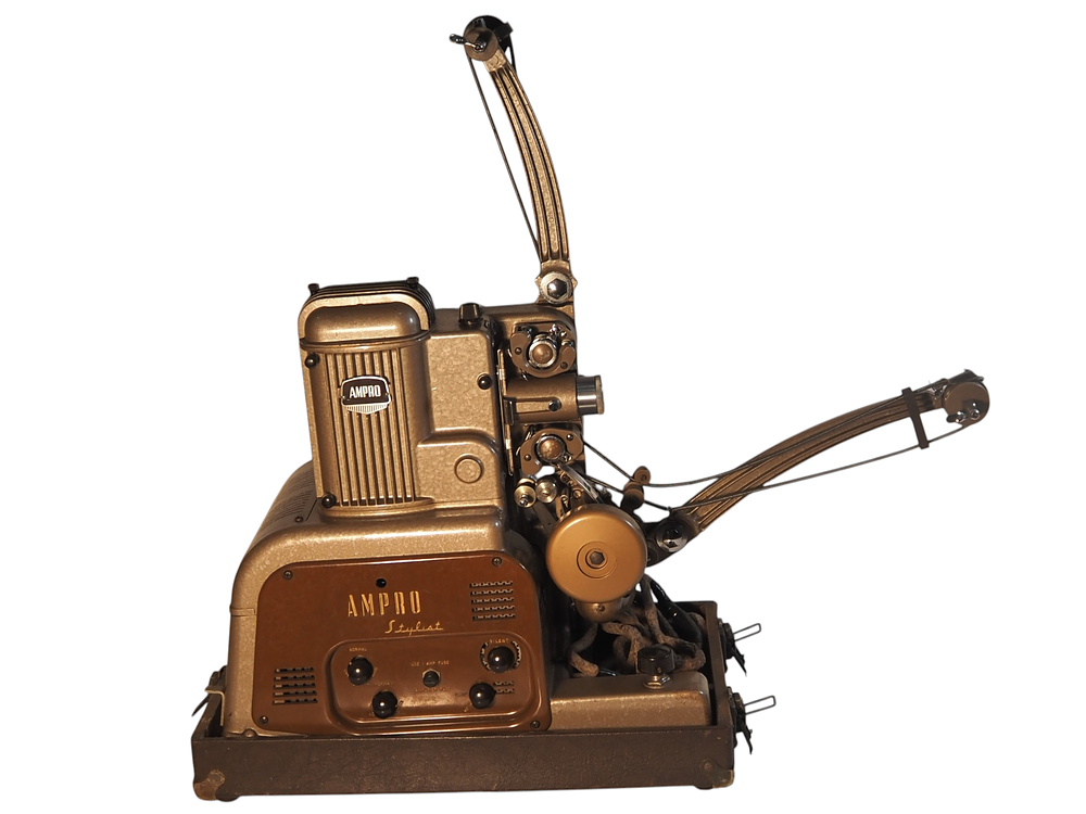 Lot 196: Ampro Stylist 16mm Film Projector Simplex Lens