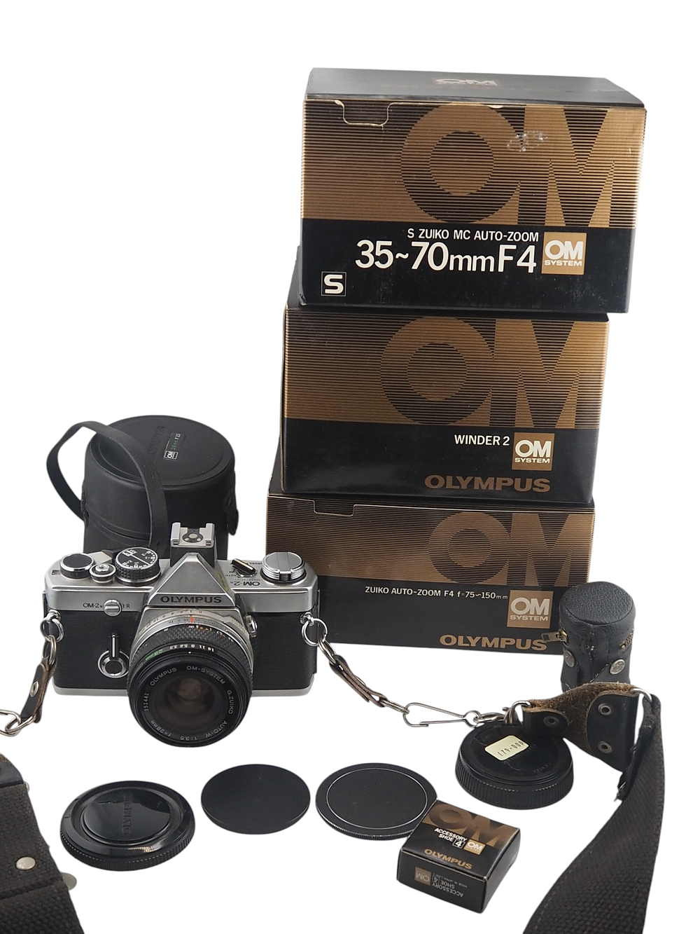 Lot 200c: Olympus OM2N 35mm SLR Camera 28mm 35 70mm 75 150mm Lenses Winder 2 Boxed Complete